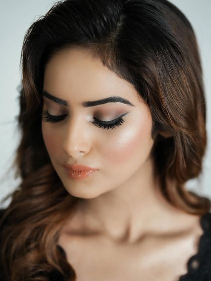 A classic winged liner look with soft contouring. This is a fundamental style that is always in demand.