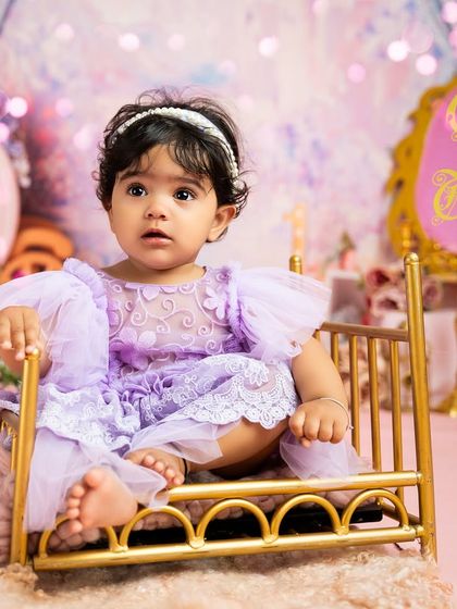 Seated on her tiny golden bed, this little princess is the star of her own fairytale. These setups are designed to be both beautiful and safe for young children.