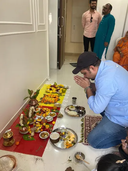 My partner Shailesh taking part in the housewarming ceremony. Our entire team is dedicated to making this day special and auspicious for our clients.