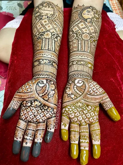 The complete engagement set for Ruchita, with matching peacock designs and personalized with her and her fiancé's names.