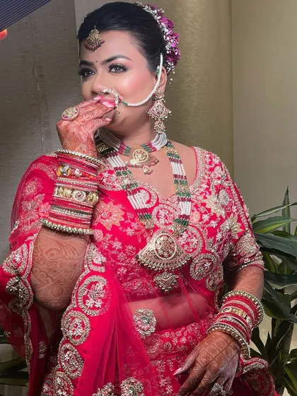 That beautiful bridal smile says it all. Her makeup was designed to be timeless, with a soft glow that enhances her features without overpowering her natural beauty.