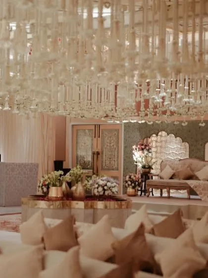The ambiance of the Sufi night, with a ceiling full of hanging floral strings and a warm, inviting layout. The design encourages guests to relax and immerse themselves in the music.