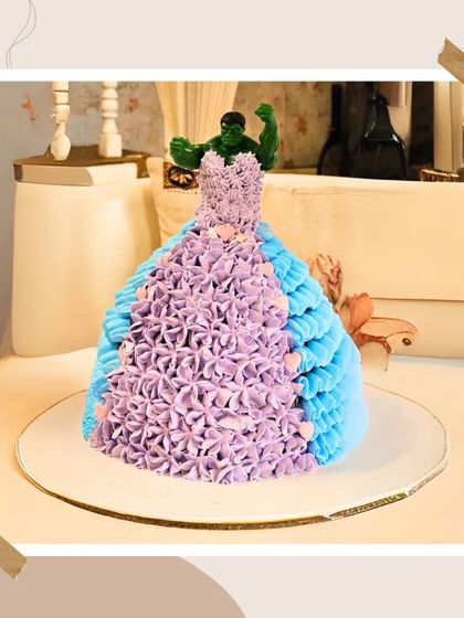 A playful and unexpected cake combining a princess dress with a Hulk topper, showing that any theme is possible.