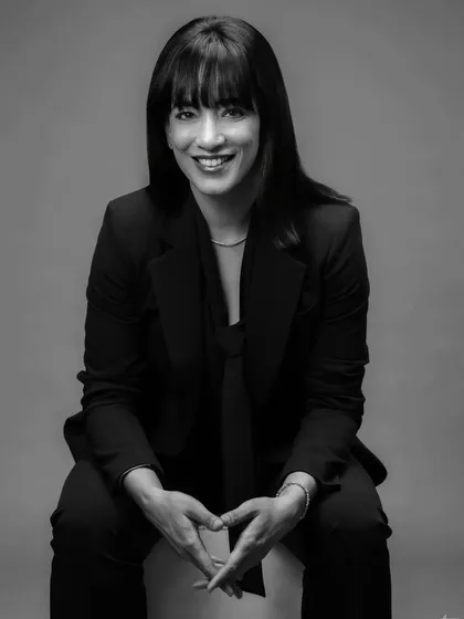 A professional headshot should feel confident and approachable. For this portrait, we chose a classic black and white style to create a powerful yet warm image, perfect for a professional's personal brand.