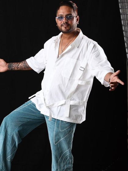 Flashing smiles and styles. A fun shot from a photoshoot, showcasing my more playful side.