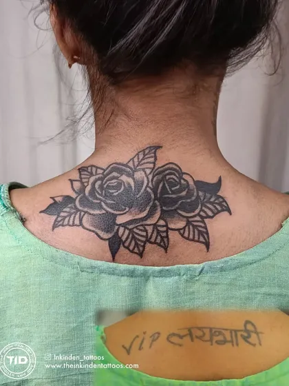 Out with the old, in with the beautiful. This client wanted to cover old script on her neck. We chose a classic black and grey rose design, carefully shaped to flow with her body and completely obscure the tattoo underneath, giving her a fresh start with a timeless piece of art.