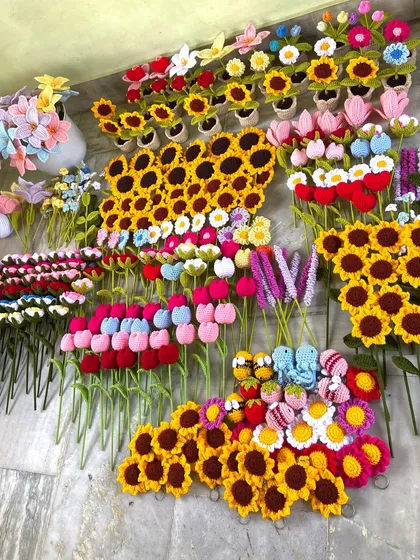 A massive order laid out on the floor, showcasing the huge variety of flower stems I can produce.