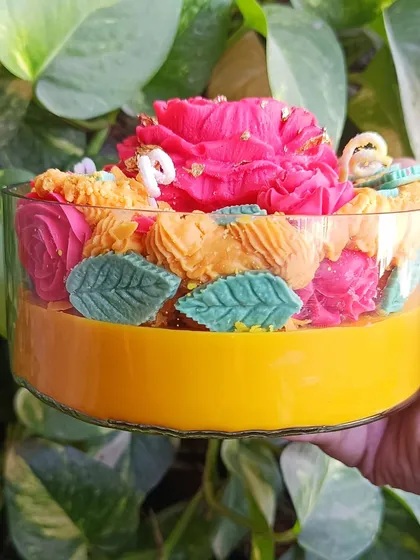 A side view of the rose garden jar candle.