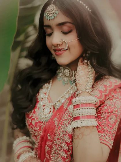 A bridal portrait is more than a picture; it's poetry. Here, I captured the bride's serene glow, the intricate details of her traditional attire, and the quiet confidence she carries on her special day.