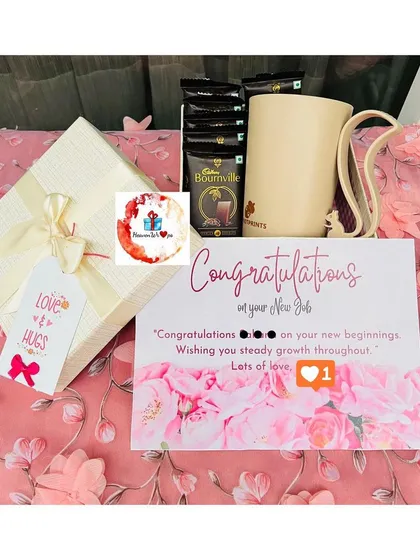 Celebrate professional milestones with a thoughtful gift set. This hamper includes a "Congratulations on your New Job" card, a stylish mug, and premium Cadbury Bournville chocolates, perfect for employee appreciation or corporate gifting.