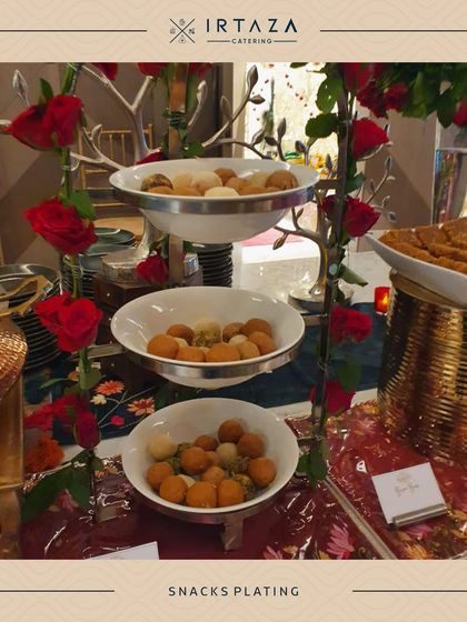 A tiered platter showcasing a variety of bite-sized snacks. This type of display is great for encouraging guests to try a little bit of everything.