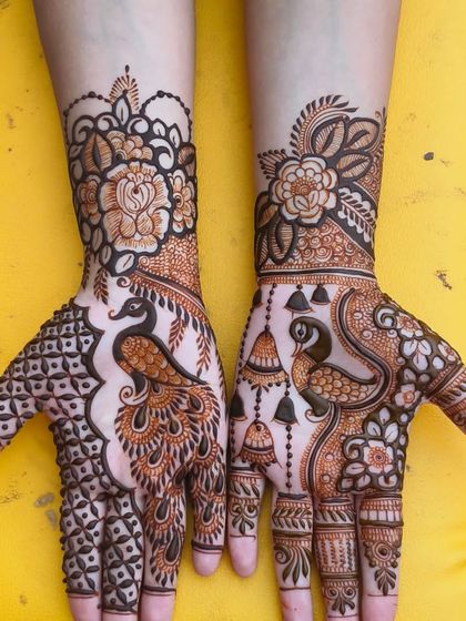 A unique design with peacocks and jhumkas.