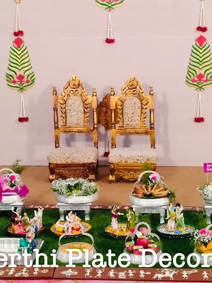 A lovely engagement platter arrangement at Brindhavan Auditorium in Coimbatore. The setup includes a variety of thematic dolls and beautifully decorated seer items.