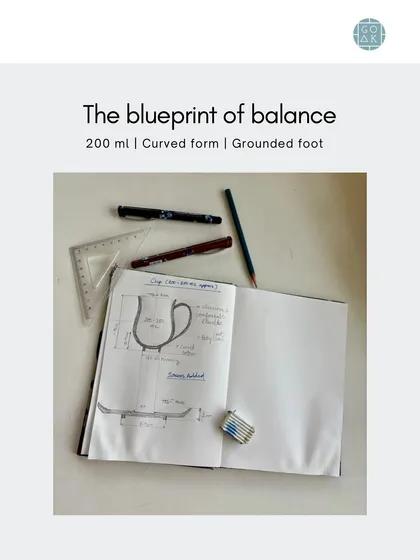The design process starts with a sketch. This is the original blueprint for the curved cup, where I work out the proportions before ever touching the clay.