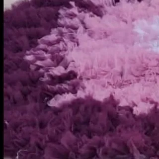 The rich texture of ombre purple ruffles. This fabric detail shot gives you a sense of the quality and artistry that goes into each gown in my collection.