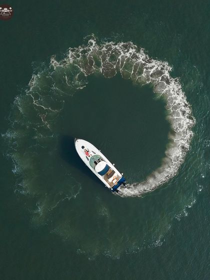 A duplicate of ID 52, this aerial photo captures the dynamic movement of the yacht. It's a testament to capturing the perfect moment for a unique and memorable shot.