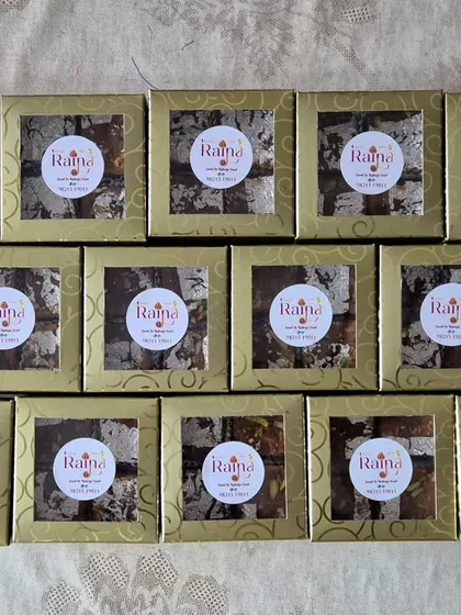 These beautiful golden boxes were used for a bulk order of Moong Daal Barfi. The presentation makes it perfect for special occasions.
