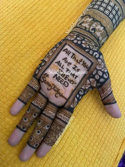 I can weave your personal story right into your mehndi. This design features a meaningful quote and the couple's wedding hashtag, making it a truly unique and personalized piece of art for your special day.
