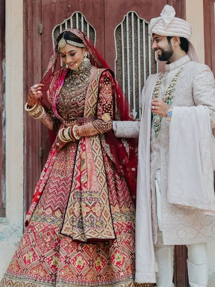 A beautiful portrait of the couple, their smiles and coordinated outfits telling a story of love and partnership.