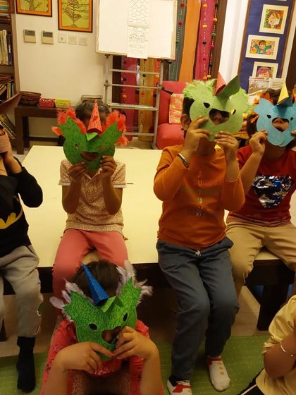We explored African "Do" masks, which are traditionally used for protection. My 4 to 7-year-old students had a blast creating and wearing their own horned masks.