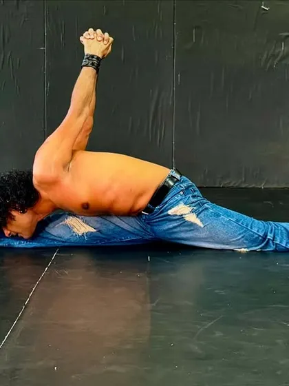 Our members inspire us every day. Here, a member shows off incredible flexibility with a full split, proving that strength and mobility go hand in hand. This is the result of dedicated training.