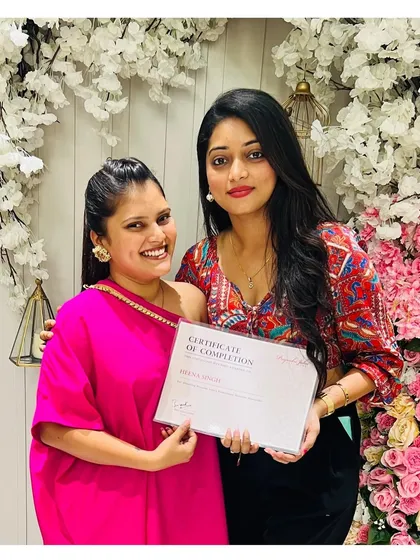 With one of my amazing teachers after completing a hairstyling course. Expanding my skills helps me provide a complete and exceptional service to my brides.