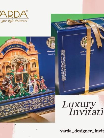 A luxury invitation box featuring a detailed 3D pop-up of a traditional ceremony. The royal blue exterior and intricate papercraft inside make this a grand and impressive way to announce a significant cultural event.