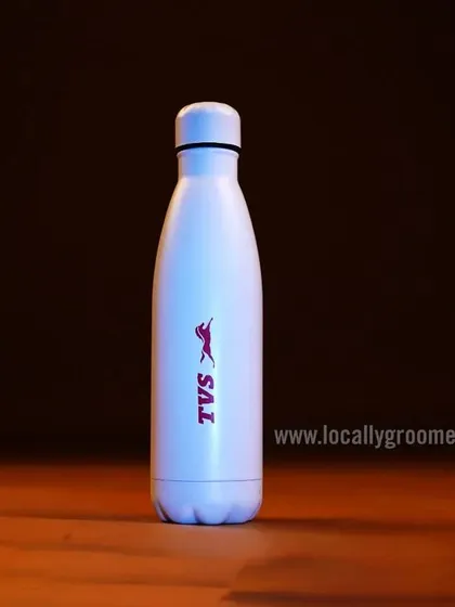 A clean and simple white water bottle with the TVS logo. This classic design is timeless and provides a great canvas for any brand.