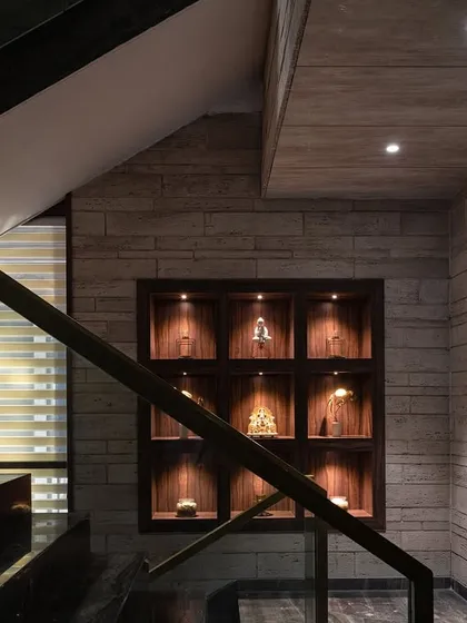 Even the transitional spaces at the Arihant project were considered. Here, automated accent lighting highlights a display niche, adding a touch of elegance to the staircase.