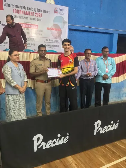 Deepit Patil receiving his award after winning the gold medal in the Men’s Singles at the 1st Maharashtra State Ranking tournament in Sangli.