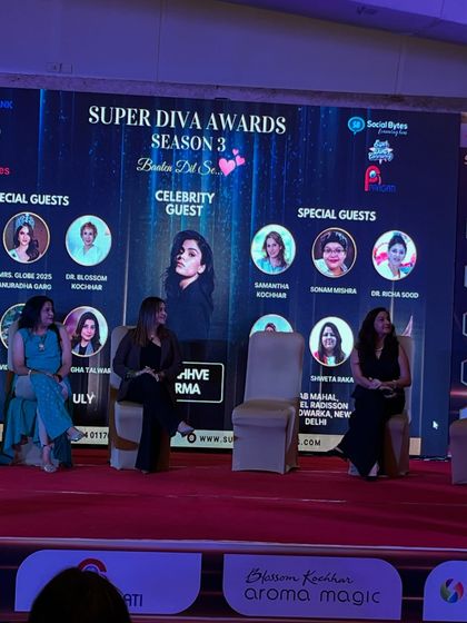 A panel discussion allows for a deeper, more interactive conversation. Here, I am seated with fellow experts, discussing various aspects of health and wellness relevant to today's working women.