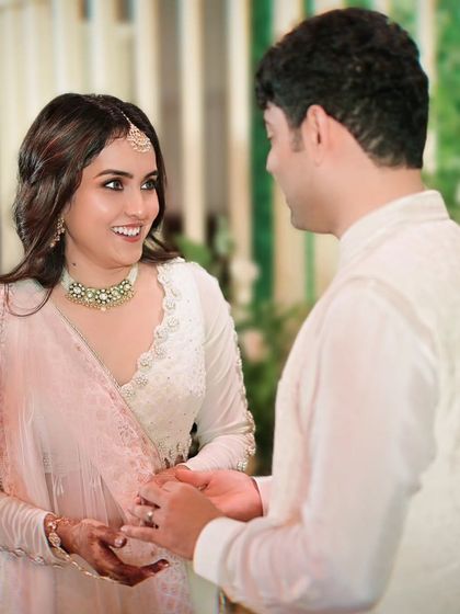 A look of pure happiness and love shared between the couple during their engagement celebration.