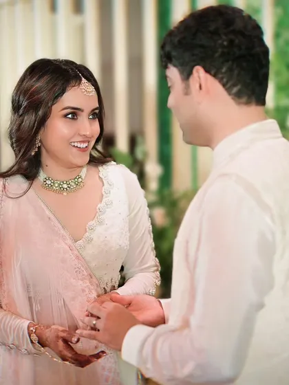 A look of pure happiness and love shared between the couple during their engagement celebration.