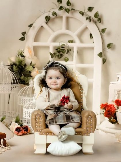 A wider view of our beautiful and intricate vintage-inspired studio setup, perfect for classic portraits.