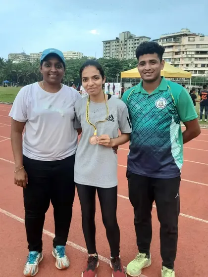 With my athlete Daphne after her bronze medal win at the ICSE/ISC Zonal Athletics Meet.