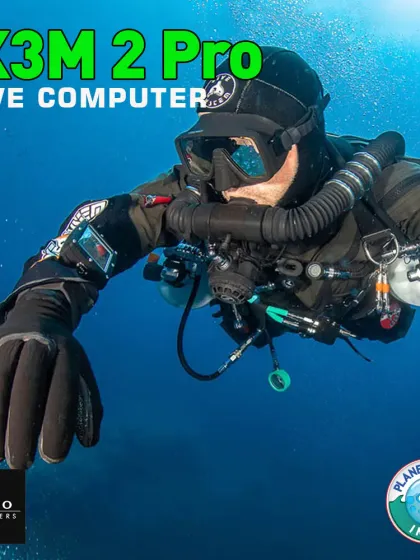 A technical diver monitors their dive parameters with the Ratio iX3M 2 Pro dive computer. This powerful device is essential for complex dives, providing real-time data for Trimix and multi-gas decompression diving, all on a large, clear display.