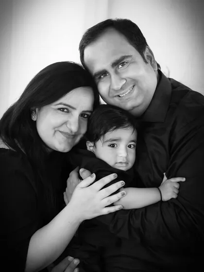 A classic black and white family hug. This intimate portrait focuses on the love and security a family provides.