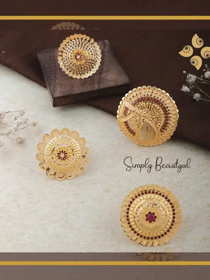 Embrace the elegance of the past with our golden treasures. This image showcases a variety of large, ornate finger rings with intricate filigree and stone work.