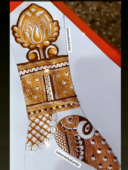 A close-up of the upper portion of the practice design, showing the detailed lotus cuff.