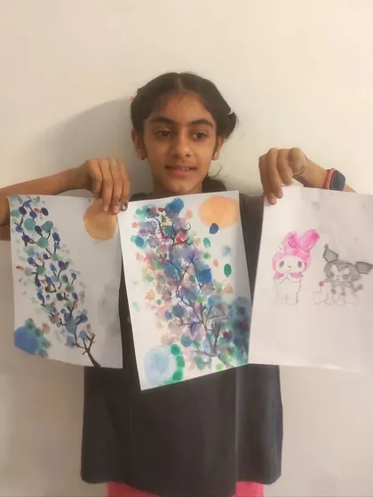 This talented artist shows off three of her recent watercolor pieces, demonstrating her range and skill.