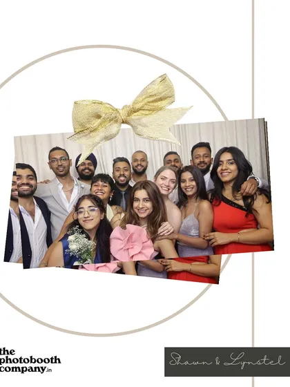 The whole squad gets together for a memorable shot at a wedding reception. Our booths are spacious enough to fit large groups, ensuring no one is left out of the picture.