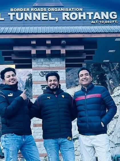 At the entrance of the Atal Tunnel in Rohtang. Our Manali retreats include exploring modern marvels as well as natural wonders.