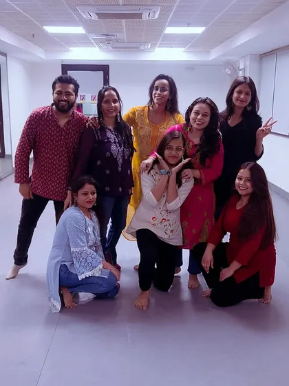 The retro vibes crew posing for a picture. The friendships formed in our classes are just as important as the dance.