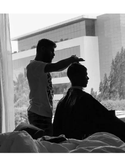 This silhouette shot from a hotel room captures the quiet focus of an on-site grooming session. It reflects the constant grind and dedication that goes into my work, no matter the location or time.
