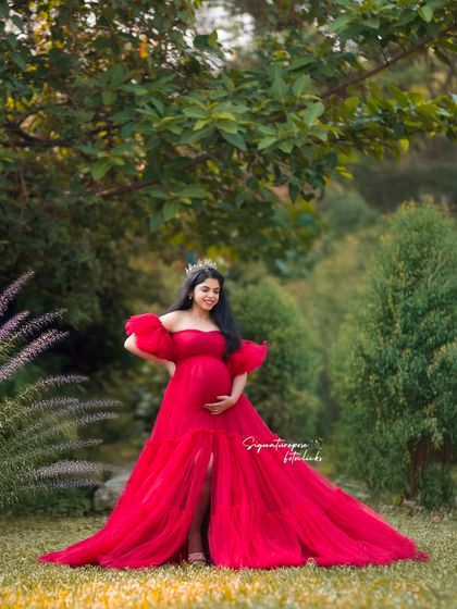 A queen in her garden. This shot captures the elegance of the gown and the beauty of the natural surroundings.