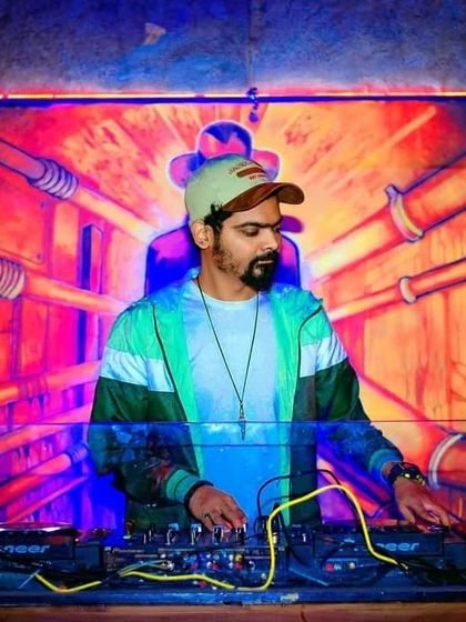 A shot from my set at The Fixx Bar, with its distinctive, colorful wall art. I adapt my style to fit the unique ambiance of every venue I play at.