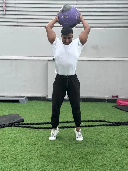Taking my own advice to live a healthier lifestyle. Here I am doing medicine ball slams, a great exercise for developing full-body power.