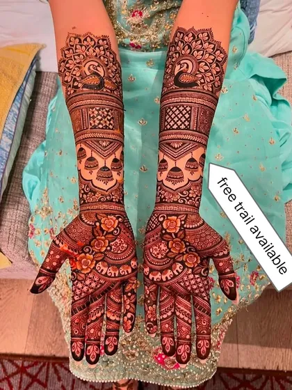 A complete bridal design that combines classic floral patterns with elegant peacock and jhumka (dangling earring) motifs. I offer a free trial so you can see my work and the quality of my henna stain for yourself, with no doubt.