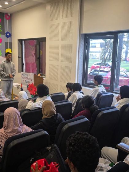 Before the competition, we talk strategy and mindset. Here I am addressing my students, preparing them mentally for the challenges ahead.