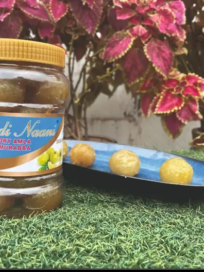 Our Dry Amla Murabba, served and ready to be enjoyed. We prepare it without syrup for a chewy texture, ensuring you get all the amla benefits in a delicious, easy to eat form.